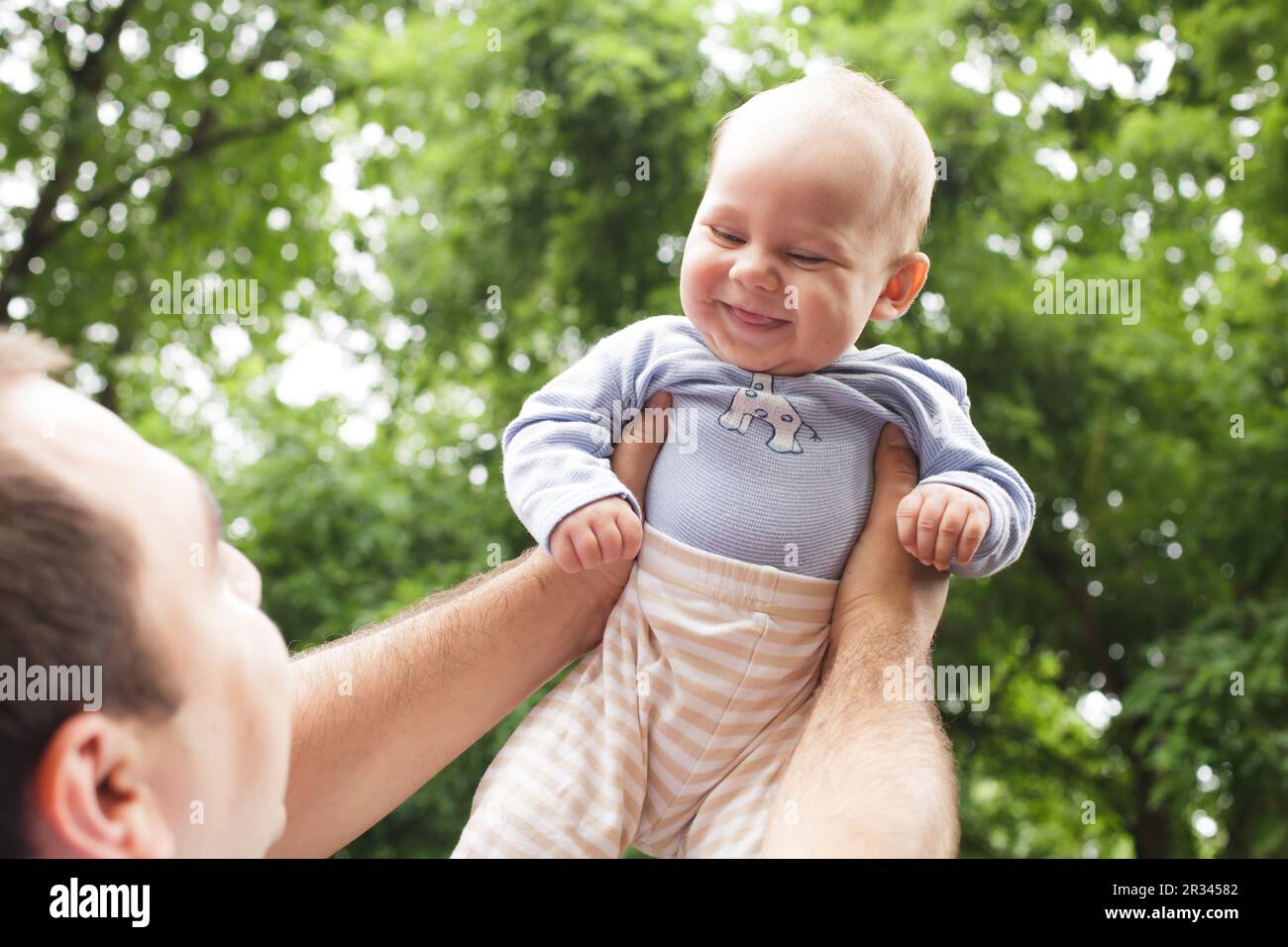 Father plays with son Stock Photo