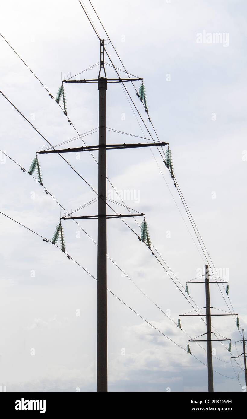 High voltage electrical tower against the sky. High voltage power lines