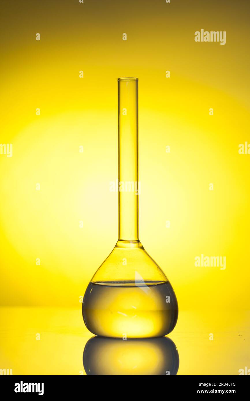 The flatbottomed flask with transparent liquid laboratory glass