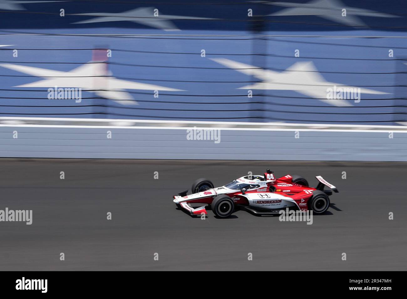 Katherine Legge, of England, drives into the first turn during practice ...