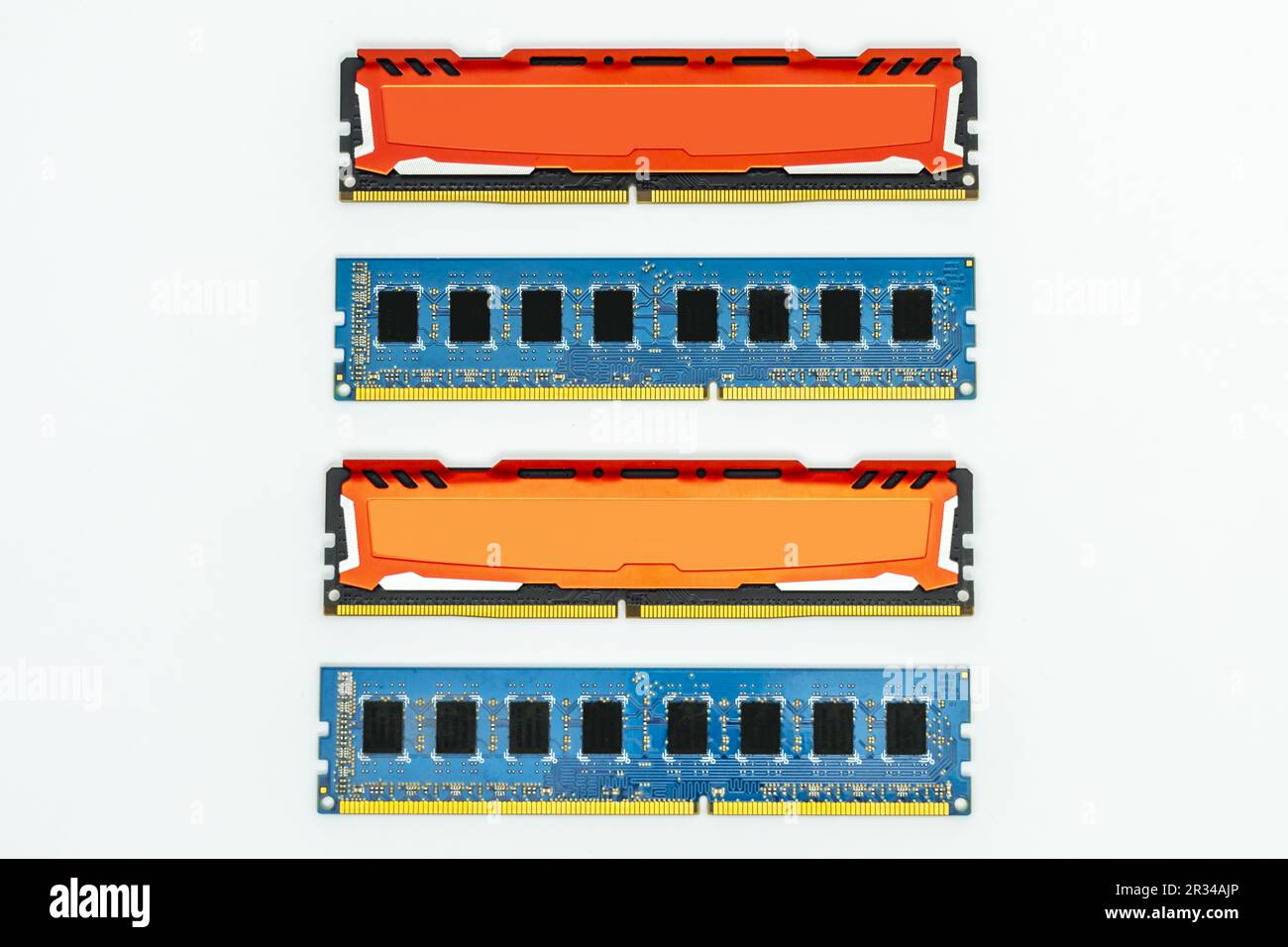 Various ddr3 and ddr4 ram memory modules of various colors on plain white background Stock Photo