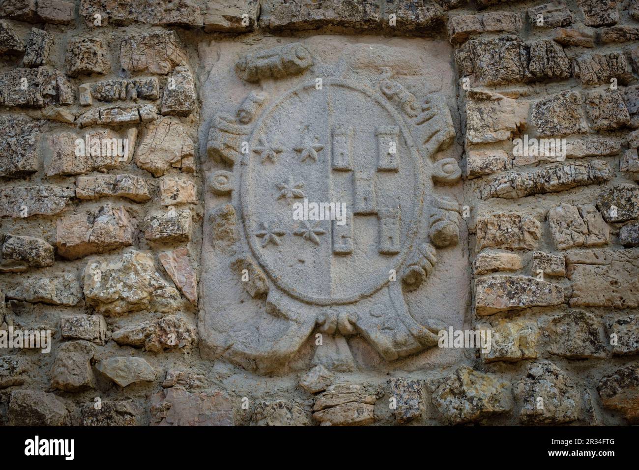 escudo nobiliario en una fachada de la calle barranco, Medinaceli, Soria, comunidad autónoma de Castilla y León, Spain, Europe. Stock Photo