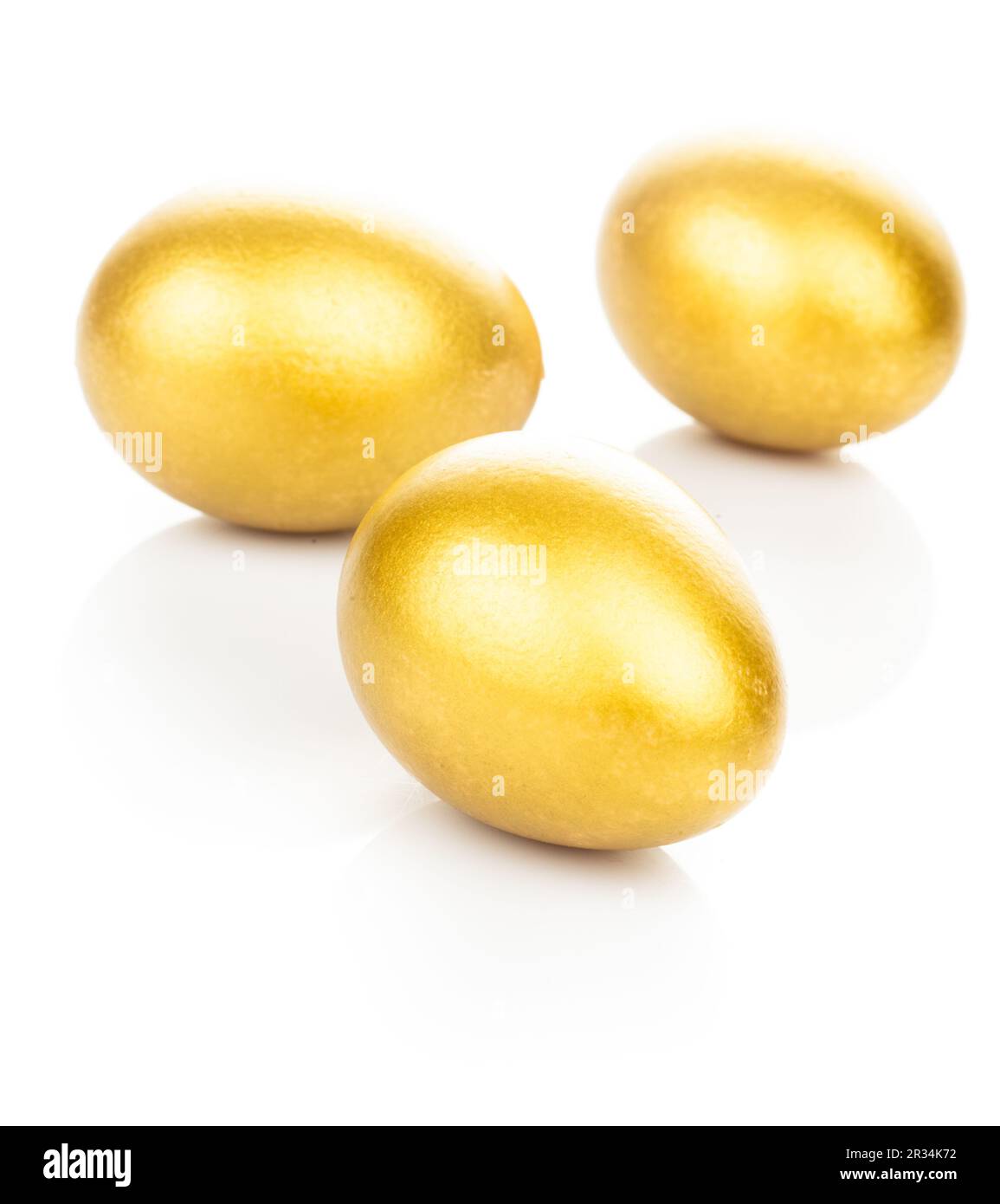 Golden eggs isolated Stock Photo Alamy