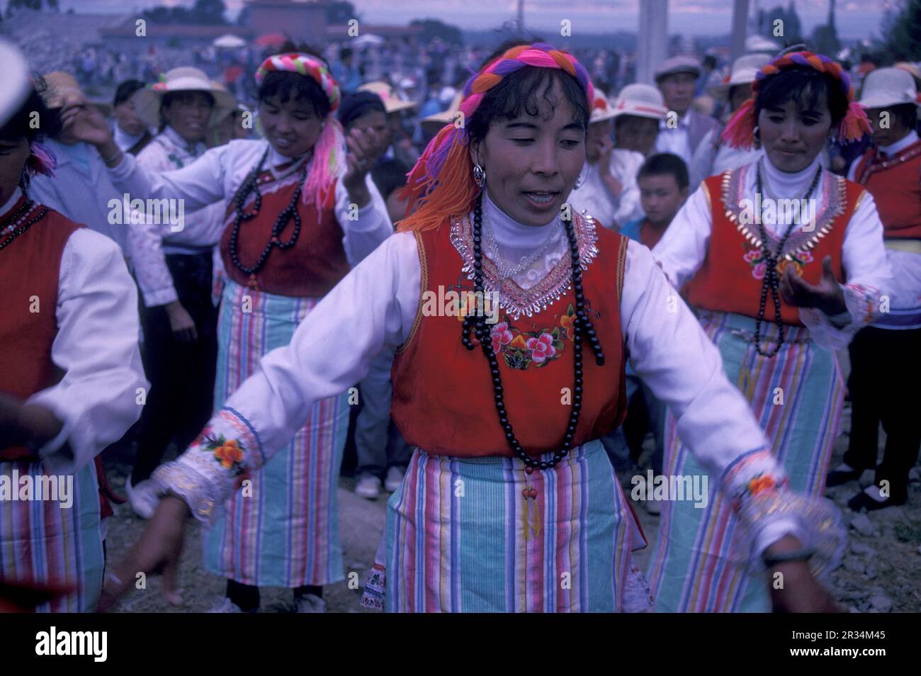 chinese Minority People in traditional costum at a spring festival near the Town of Dali on the Er Hai Lake in the province of Yunnan in China in east Stock Photo