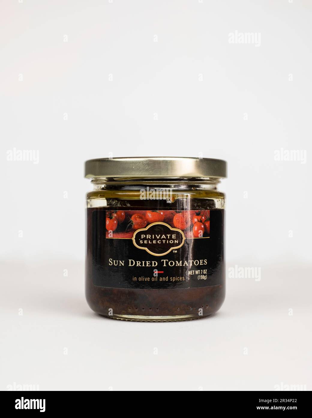 Jar of Private Selection brand sun dried tomatoes, white background