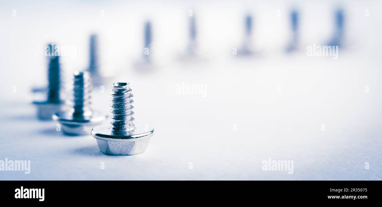 Abstract Shot Of Computer Screws On Background Stock Photo
