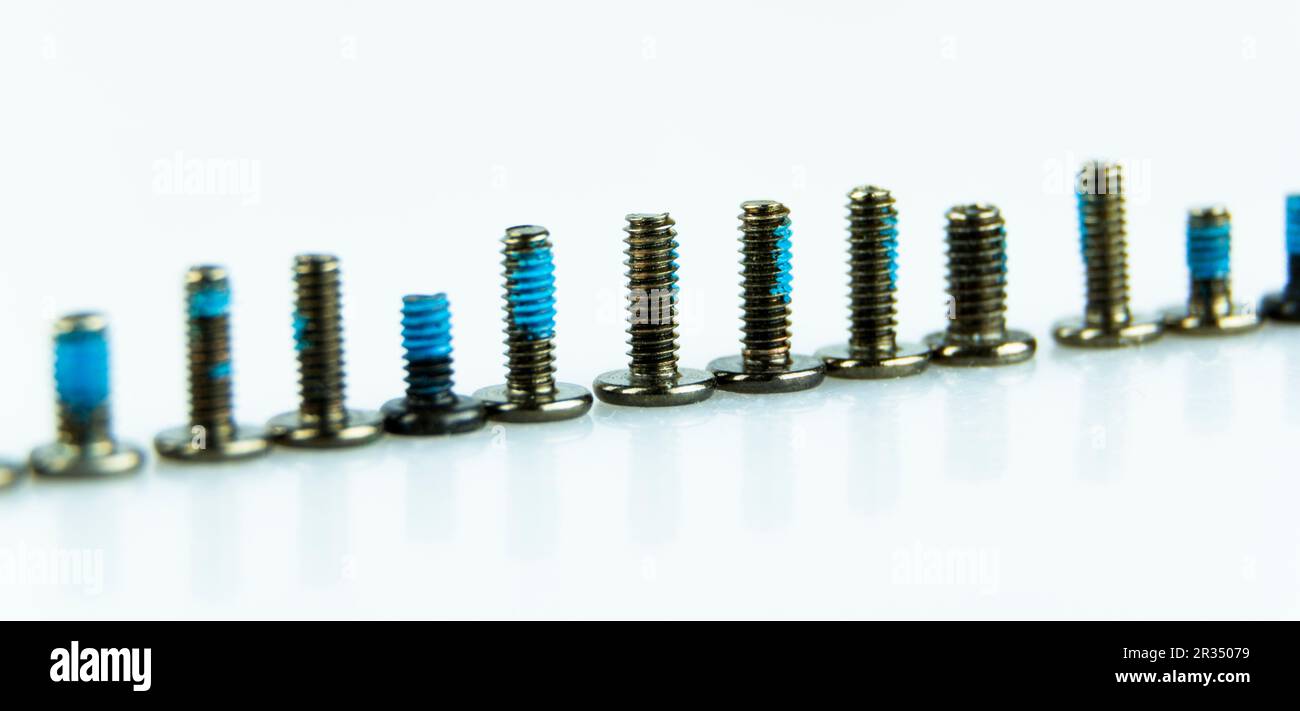 Abstract Shot Of Computer Screws On  Background Stock Photo