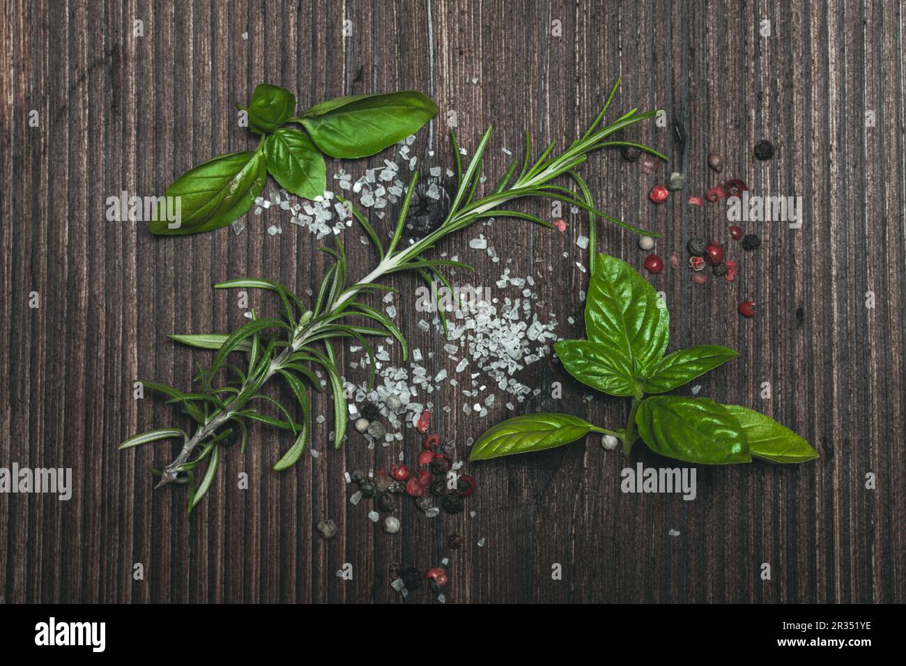 Scattered herbs and salt Stock Photo