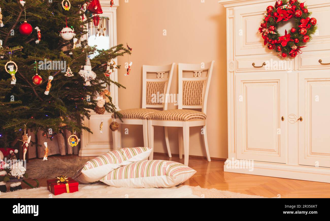 Christmas tree in living room Stock Photo - Alamy