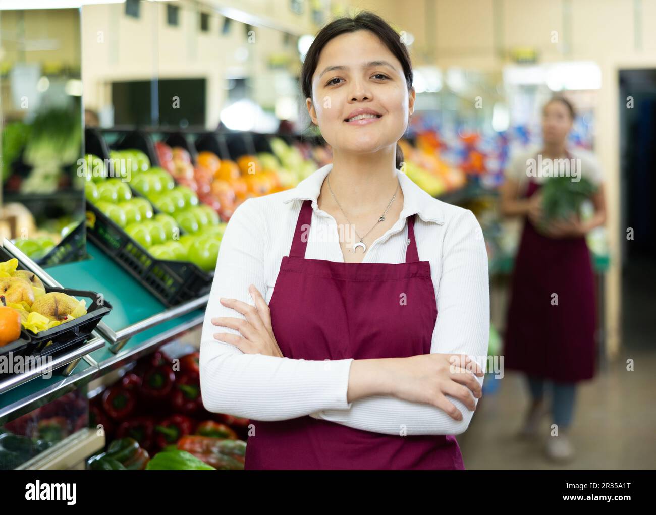 Fruit vendor waits customers market hi-res stock photography and