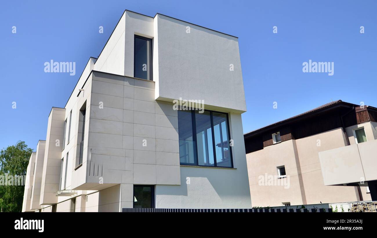 White apartment complex. A small fragment of a modern apartment building. Stock Photo