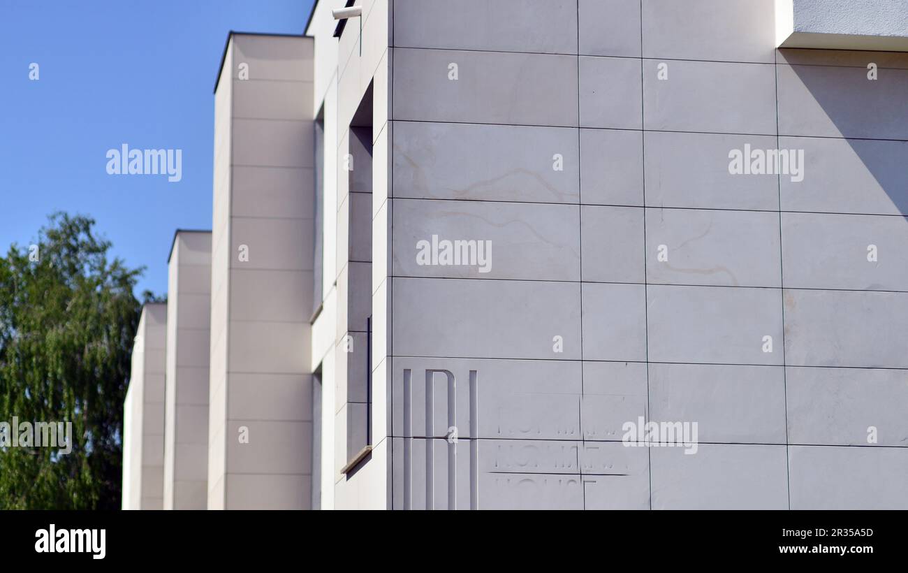White apartment complex. A small fragment of a modern apartment building. Stock Photo