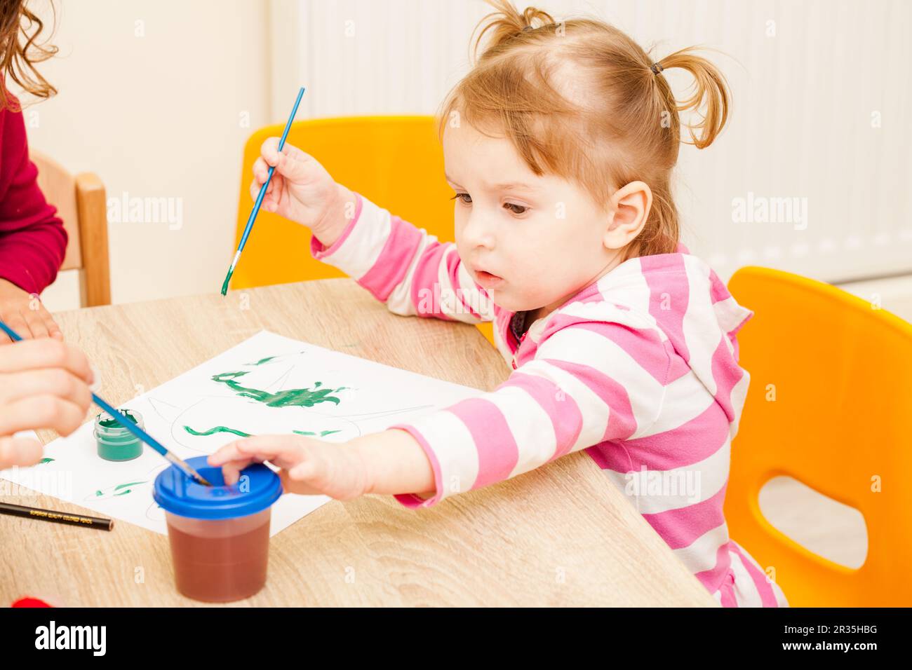 Girl is painting Stock Photo