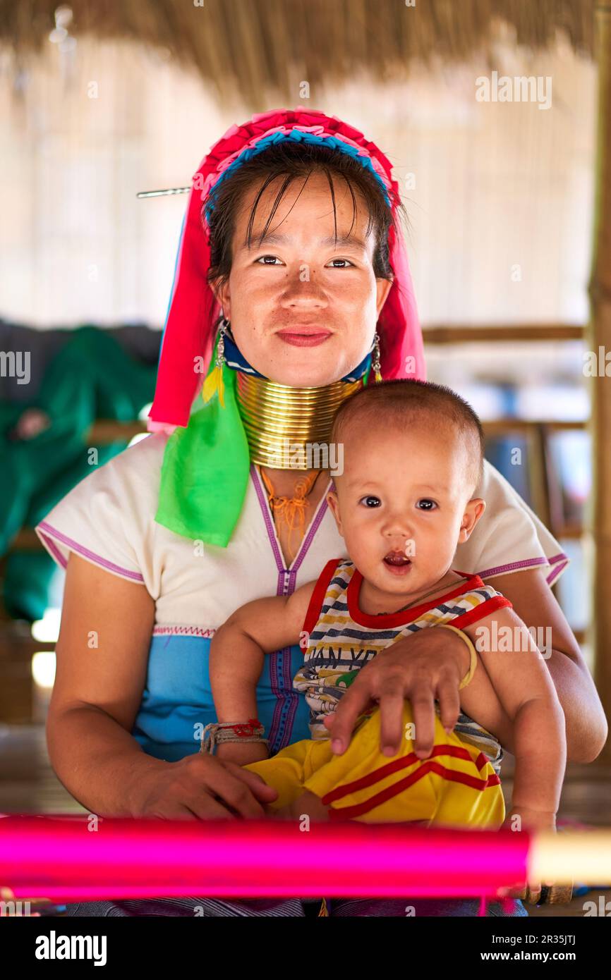 woman from the longnecked tribe, known for the metal rings worn around