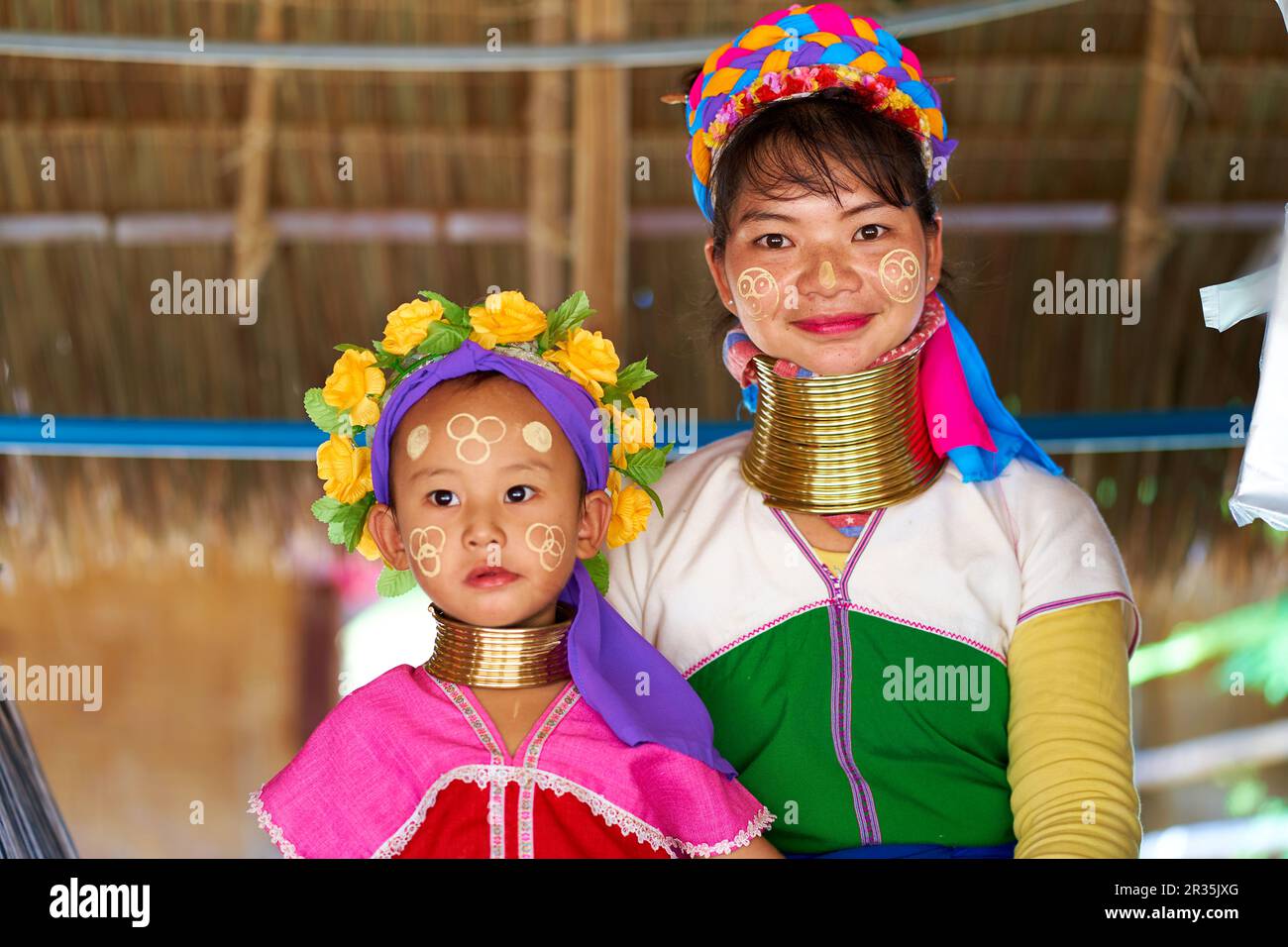 woman from the longnecked tribe, known for the metal rings worn around