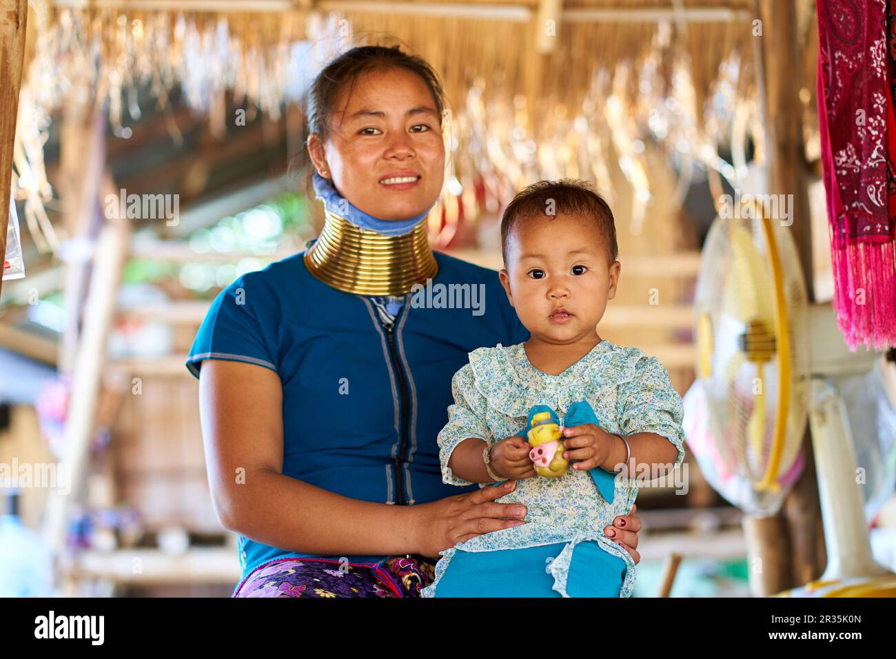 woman from the longnecked tribe, known for the metal rings worn around