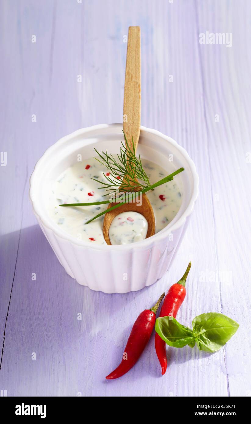 Herb and quark dressing with chilli Stock Photo Alamy