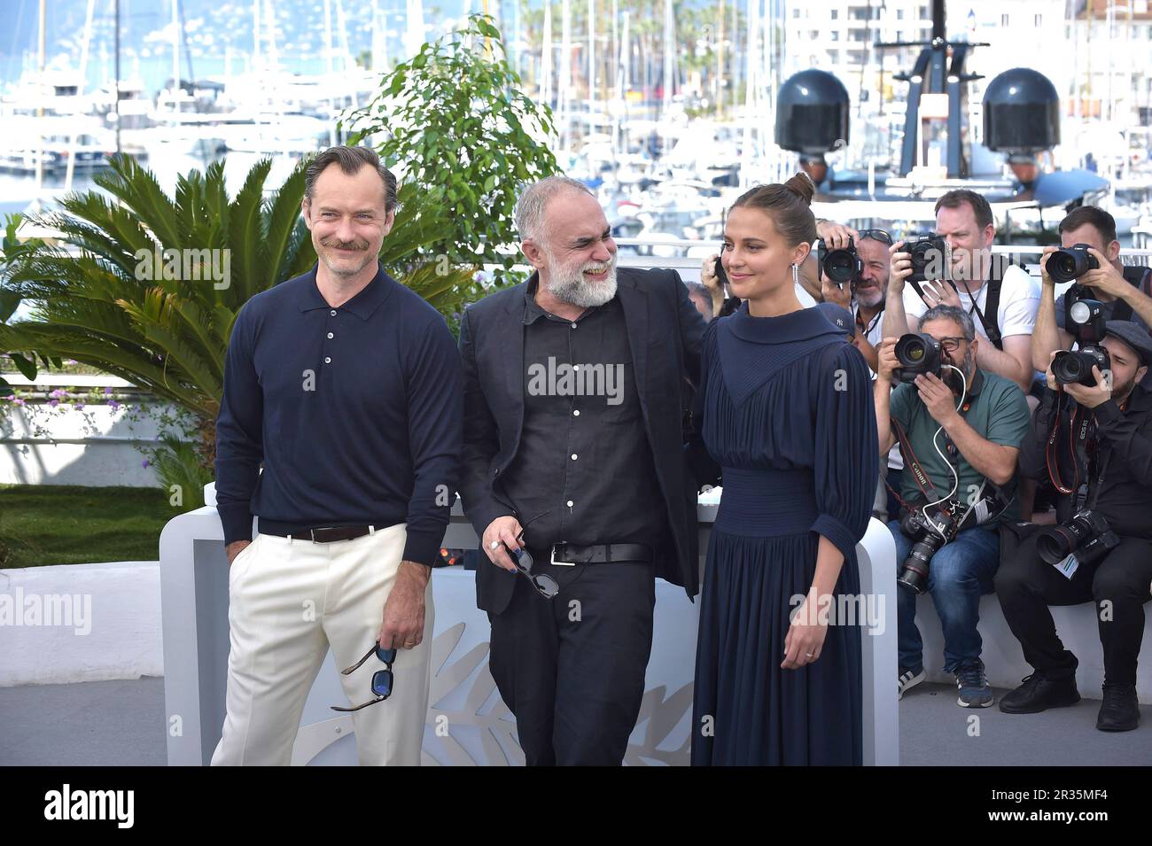 Cannes, France. 22nd May, 2023. Jude Law, Alicia Vikander and Karim Aïnouz arrive at the 'Firebrand (Le Jeu De La Reine)' photocall at the 76th annual Cannes film festival at Palais des Festivals on May 22, 2023 in Cannes, France. Photo by Rocco Spaziani/UPI Credit: UPI/Alamy Live News Stock Photo