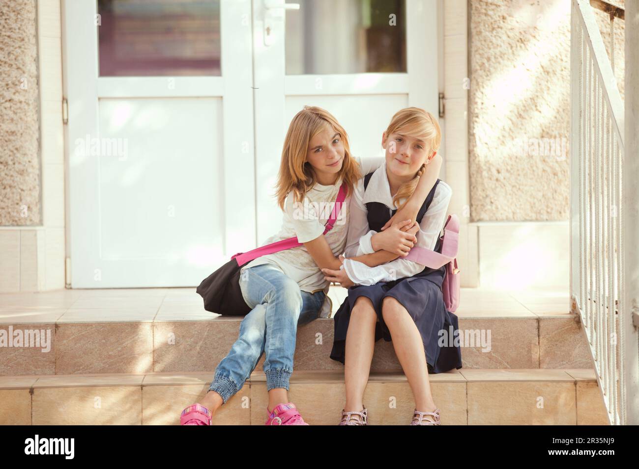 Two schoolgirls outdoors Stock Photo