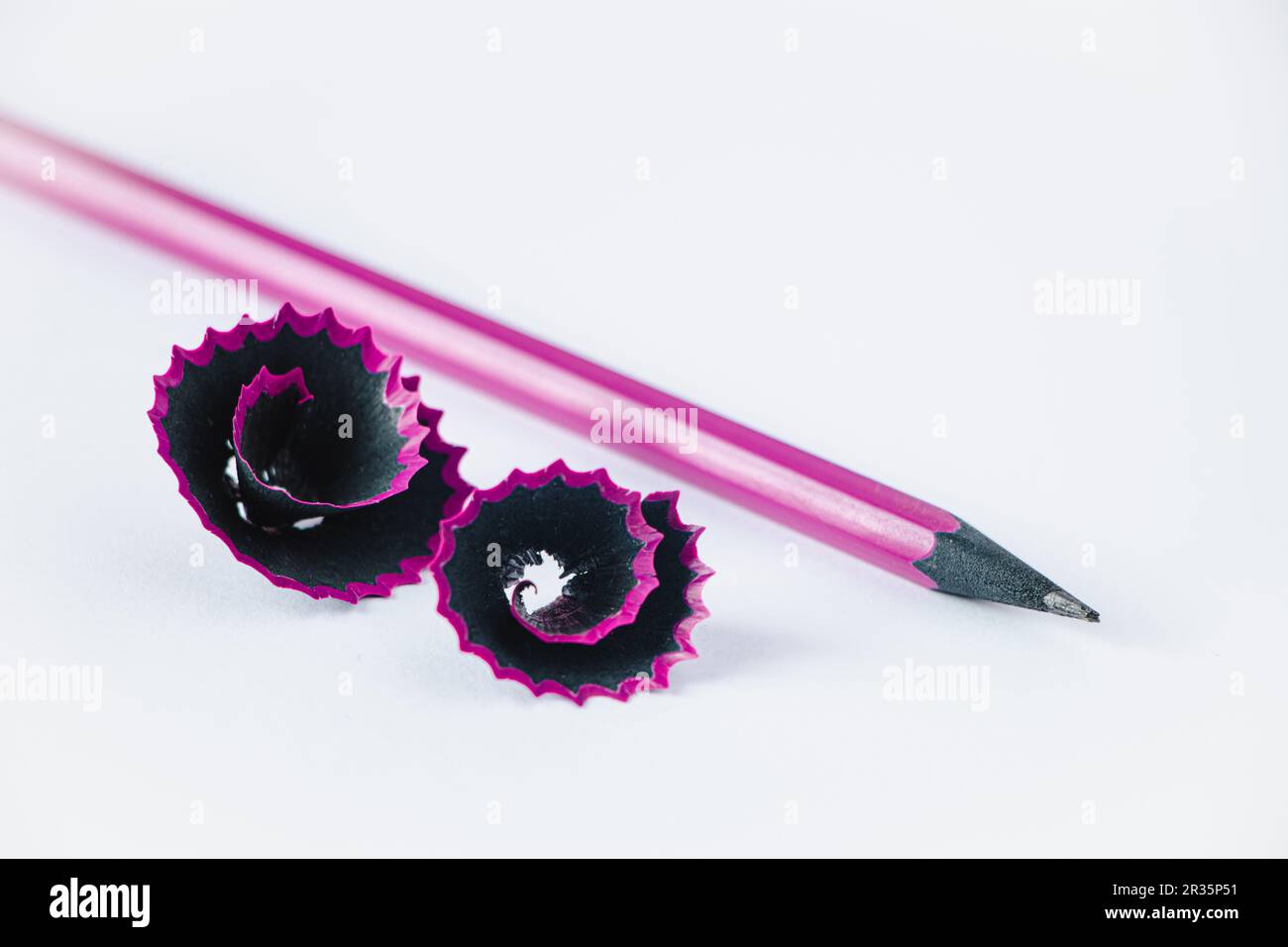 Sharpening graphic pencil for drawing. Wooden purple pencil and ...