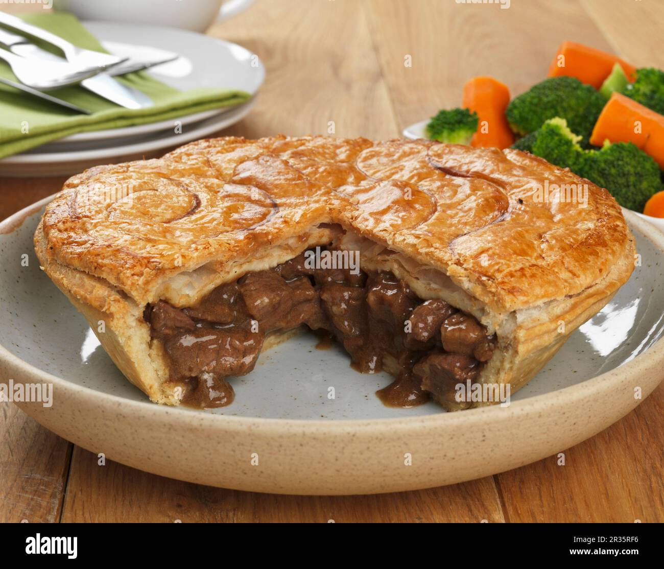 Steak and onion pie, sliced Stock Photo Alamy