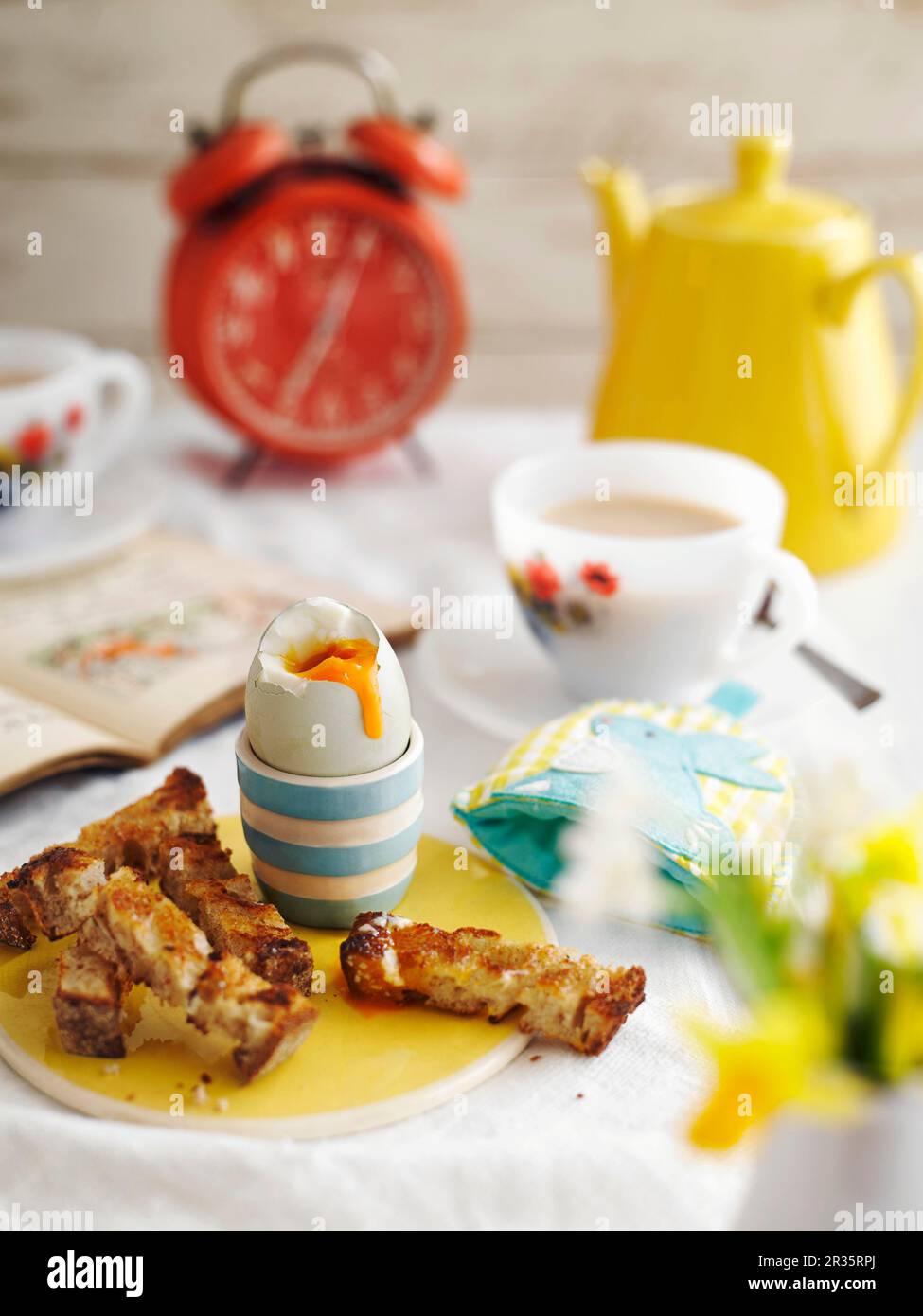 Breakfast with a soft boiled egg and toast soldiers Stock Photo