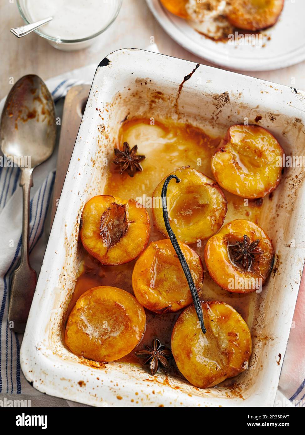 Oven baked nectarines with spices Stock Photo Alamy