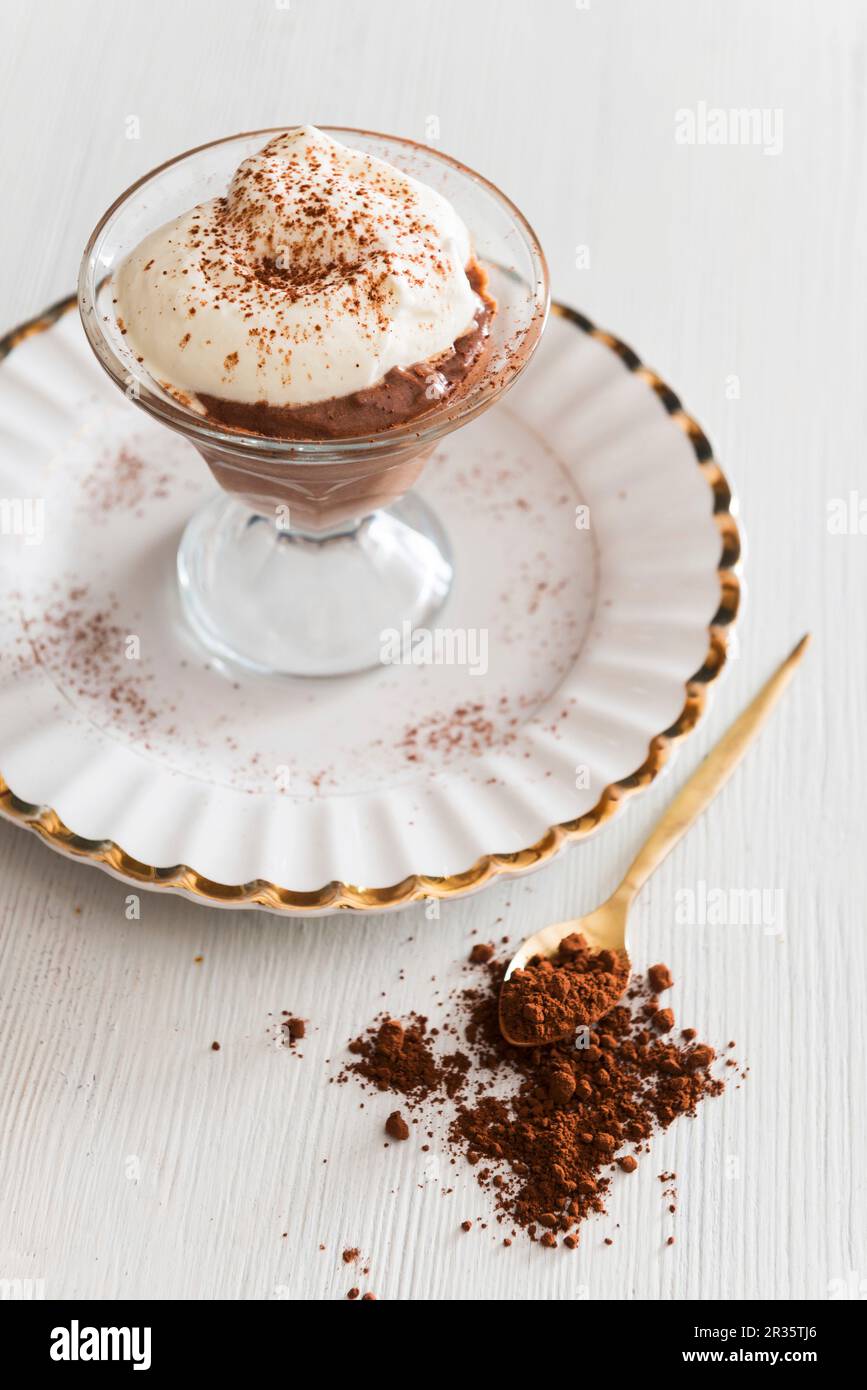 Chocolate mousse with cream and cocoa powder Stock Photo Alamy