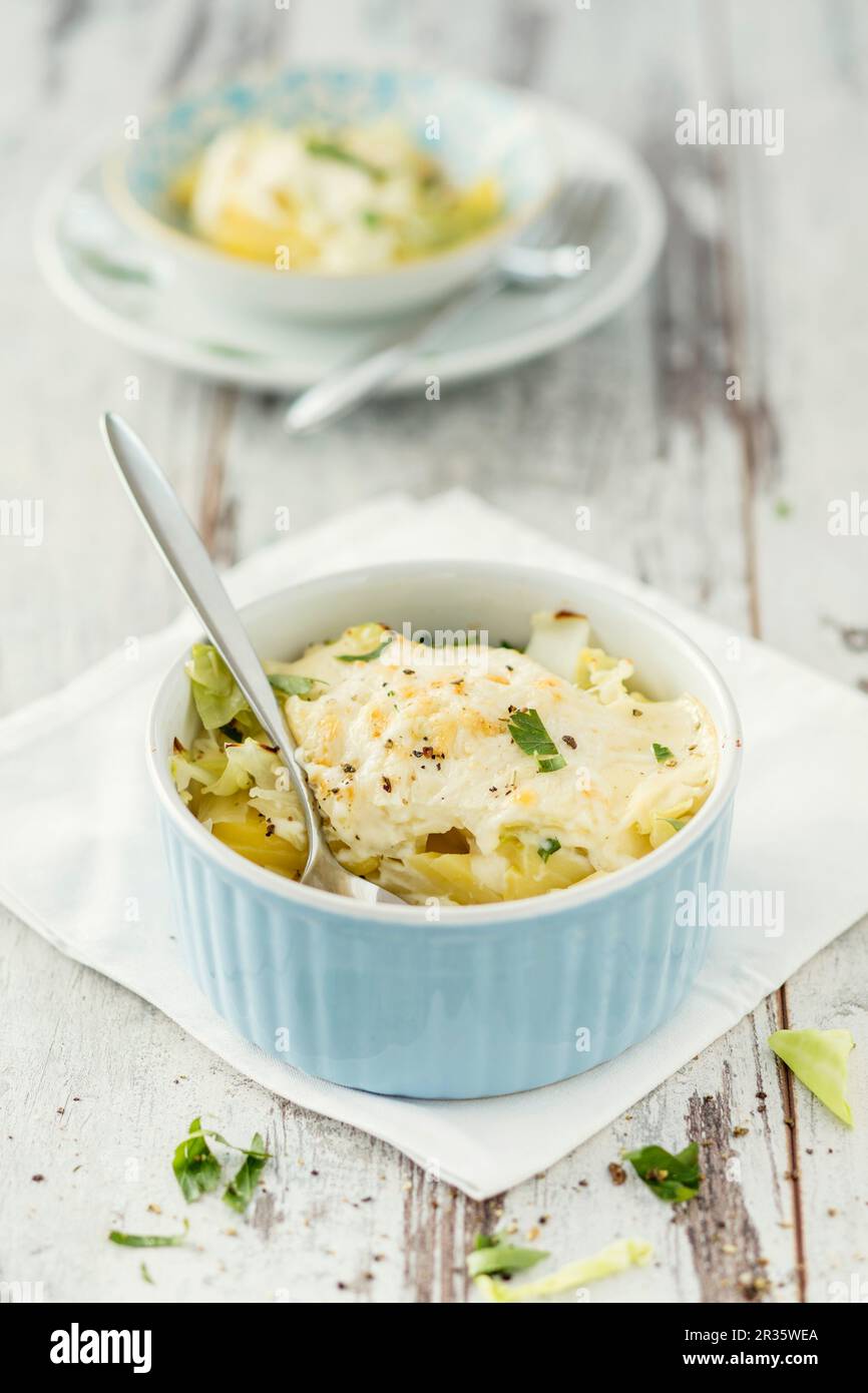 Potato and pointed cabbage gratin Stock Photo