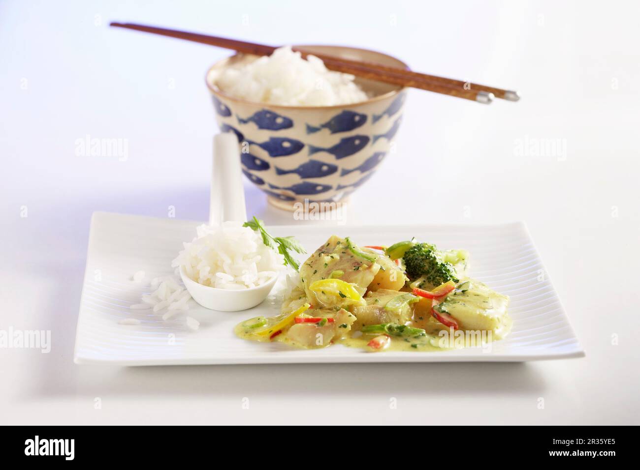 Fish curry with jasmine rice Stock Photo - Alamy