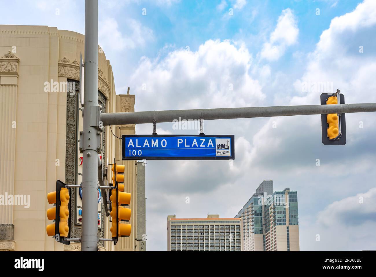 San Antonio, Texas, USA – May 8, 2023: Alamo Plaza street name sign hanging from a traffic light pole in Downtown San Antonio, Texas. Stock Photo