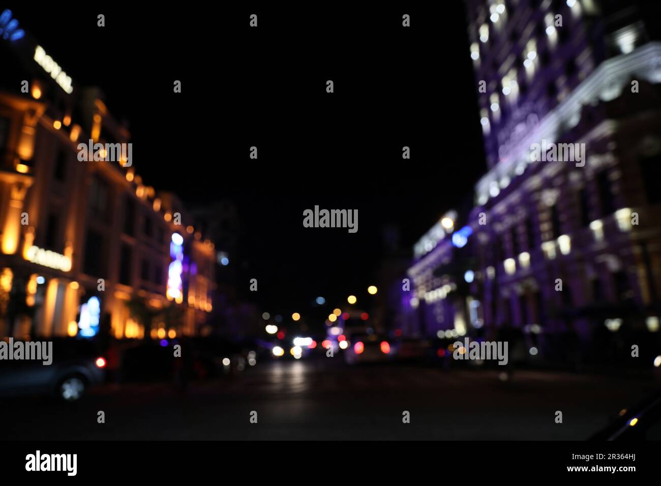 Blurred view of city street with lights at night. Bokeh effect Stock ...