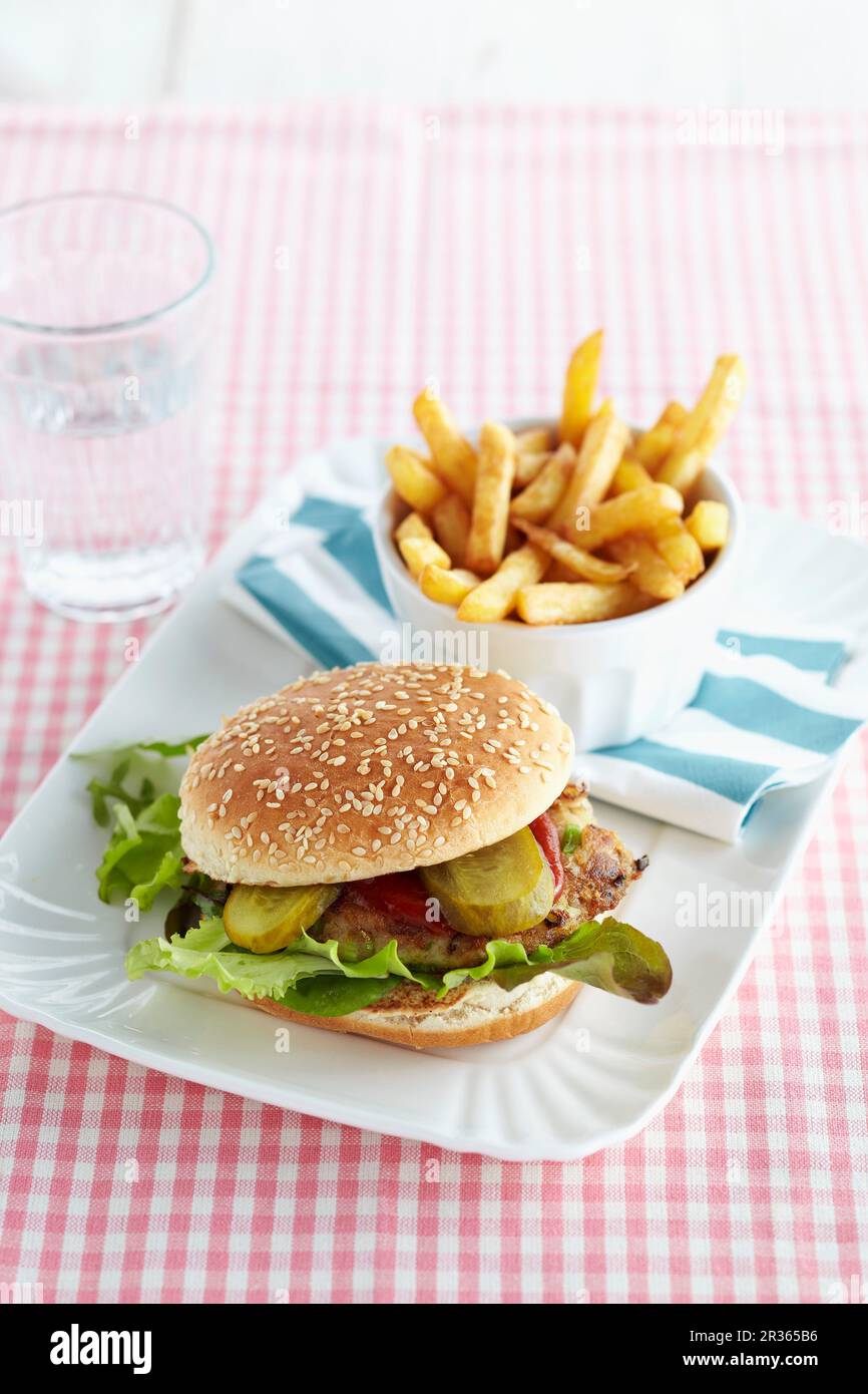 A mackerel burger with chips Stock Photo Alamy