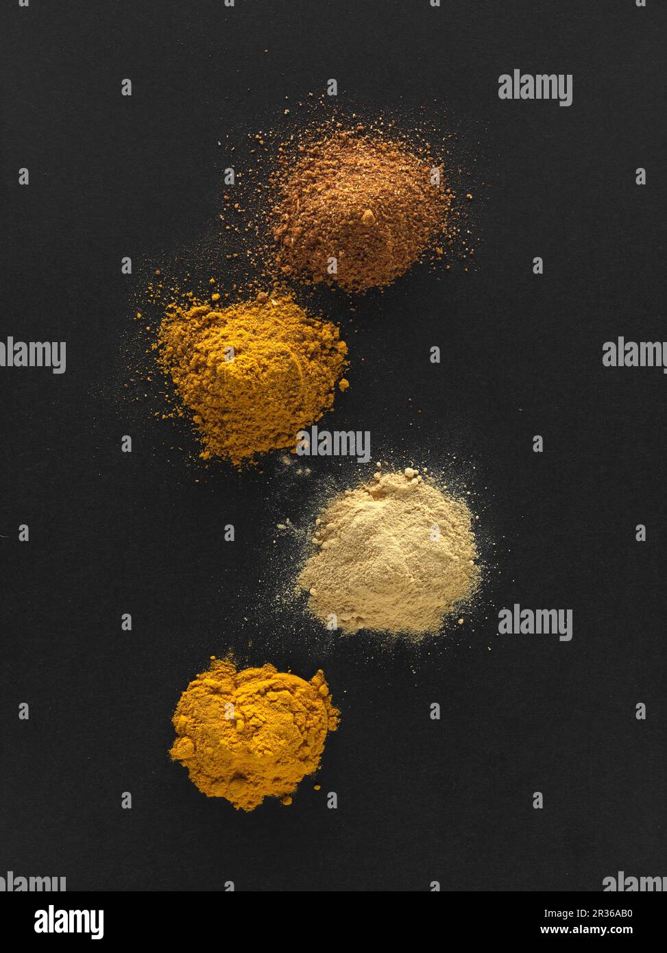 Curry powders, ground ginger and ground turmeric Stock Photo