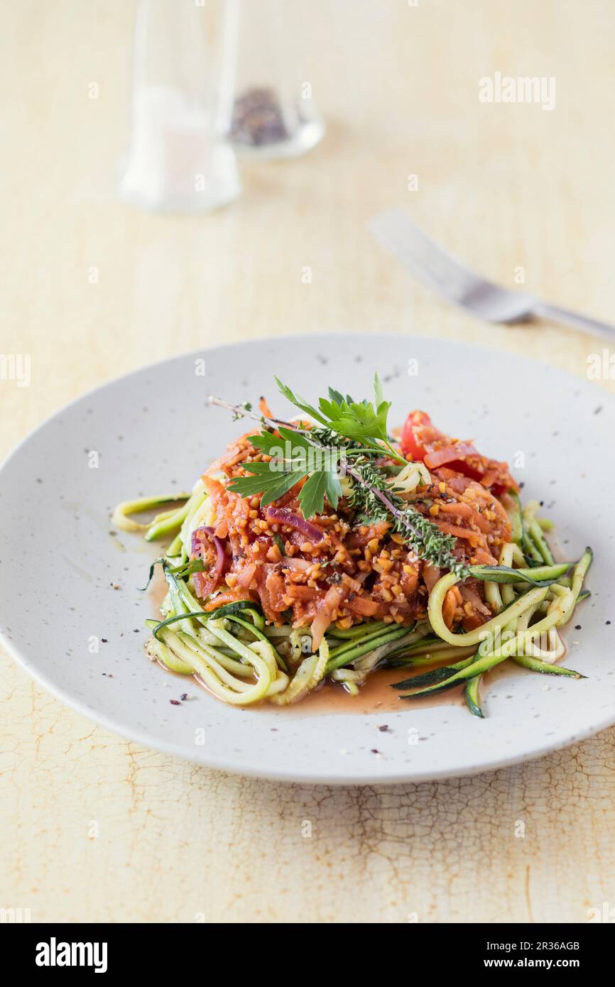 Courgette pasta with lupine bolognese Stock Photo Alamy