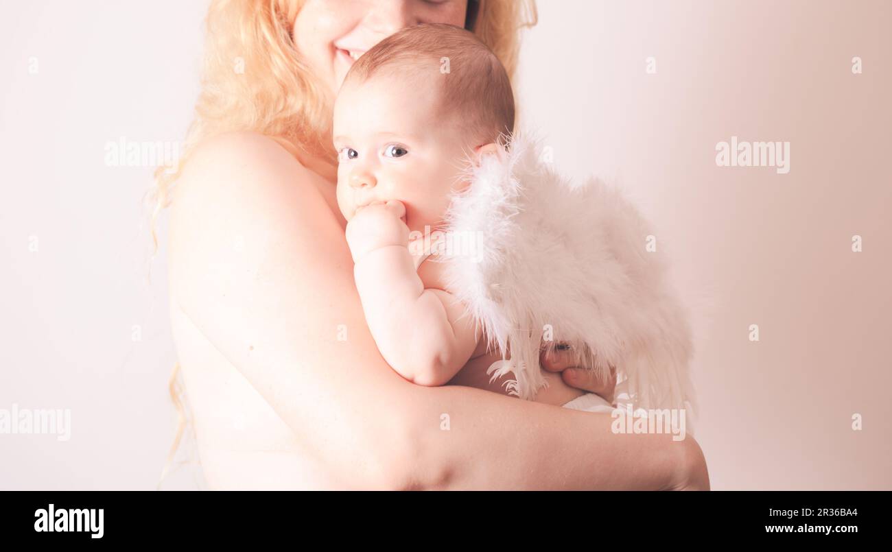 Portrait of mom with her baby angel Stock Photo