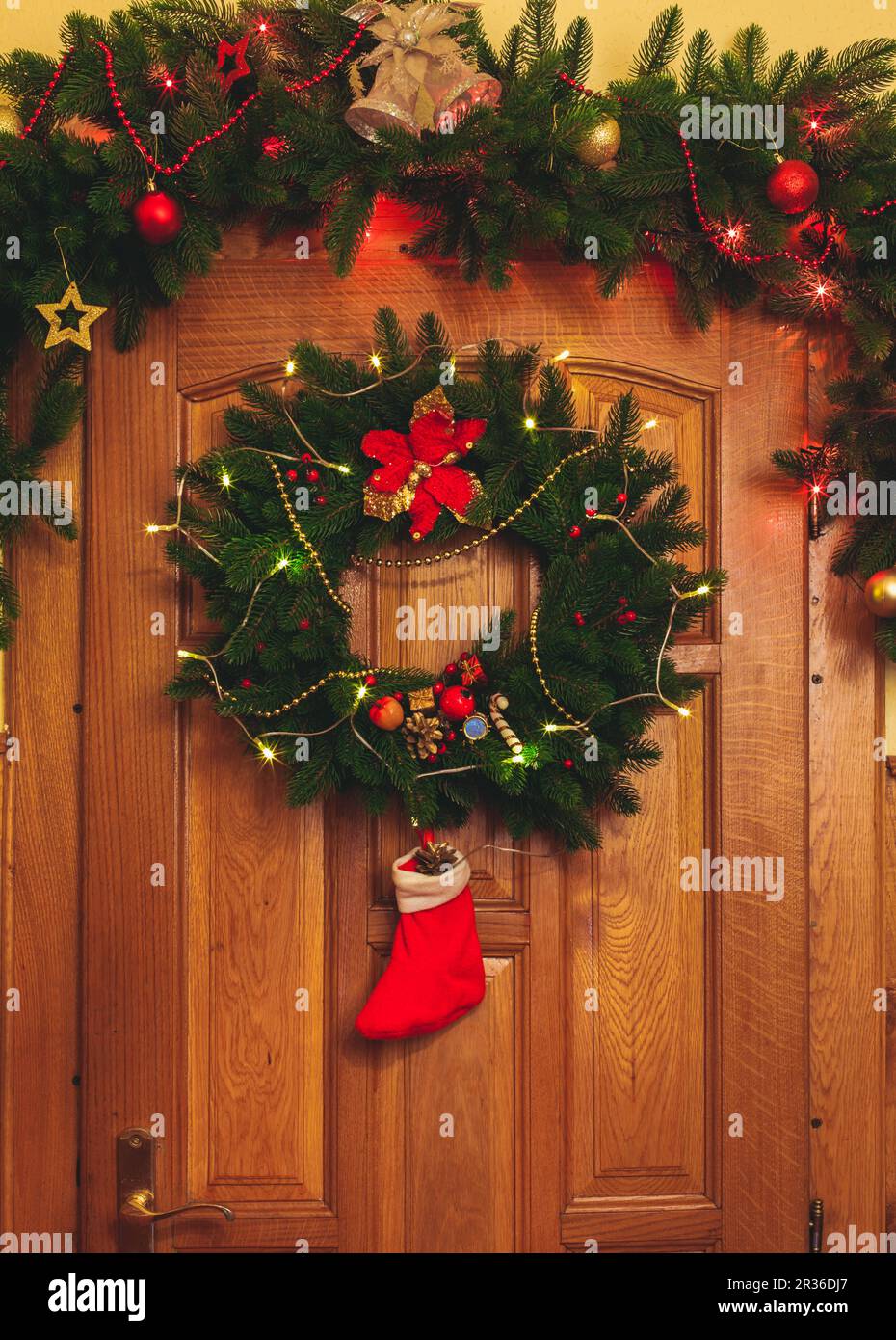 Christmas wreath on door Stock Photo Alamy
