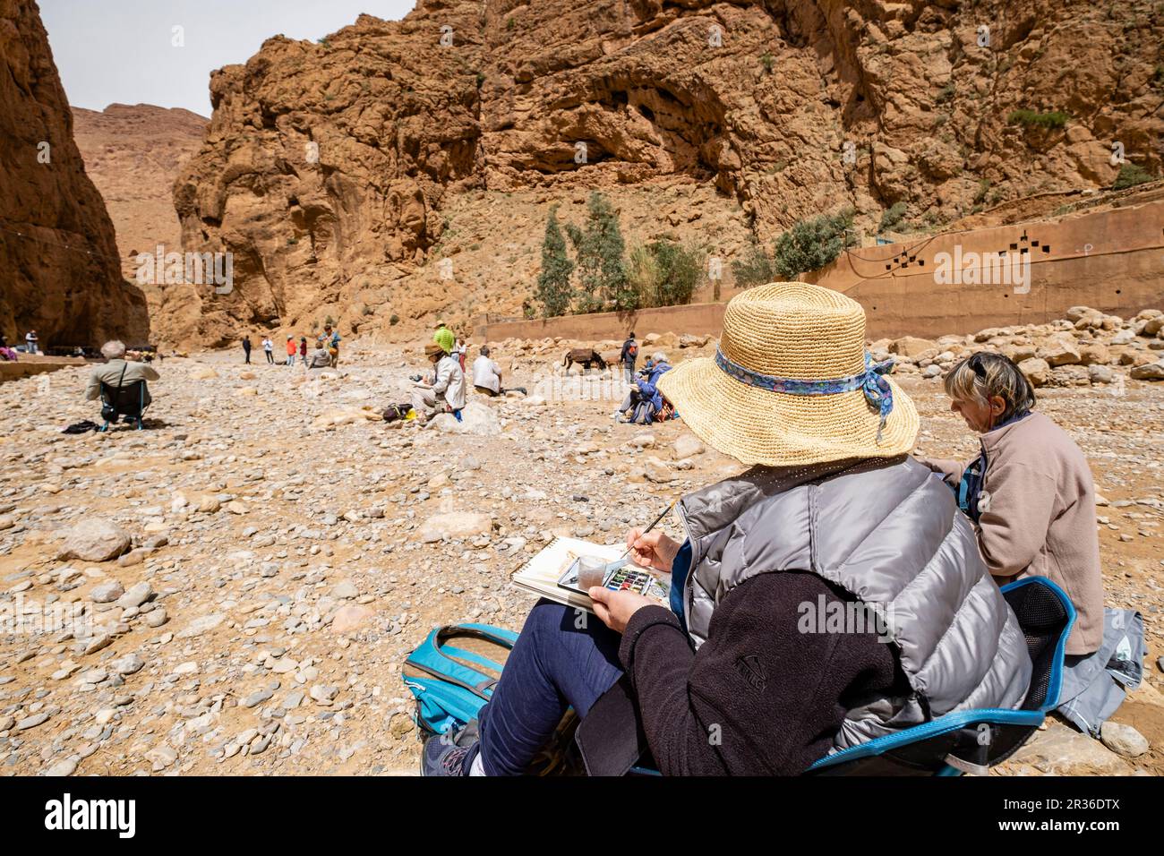 school of painters studying in the Todgha Gorges, High Atlas, Morocco, Africa. Stock Photo