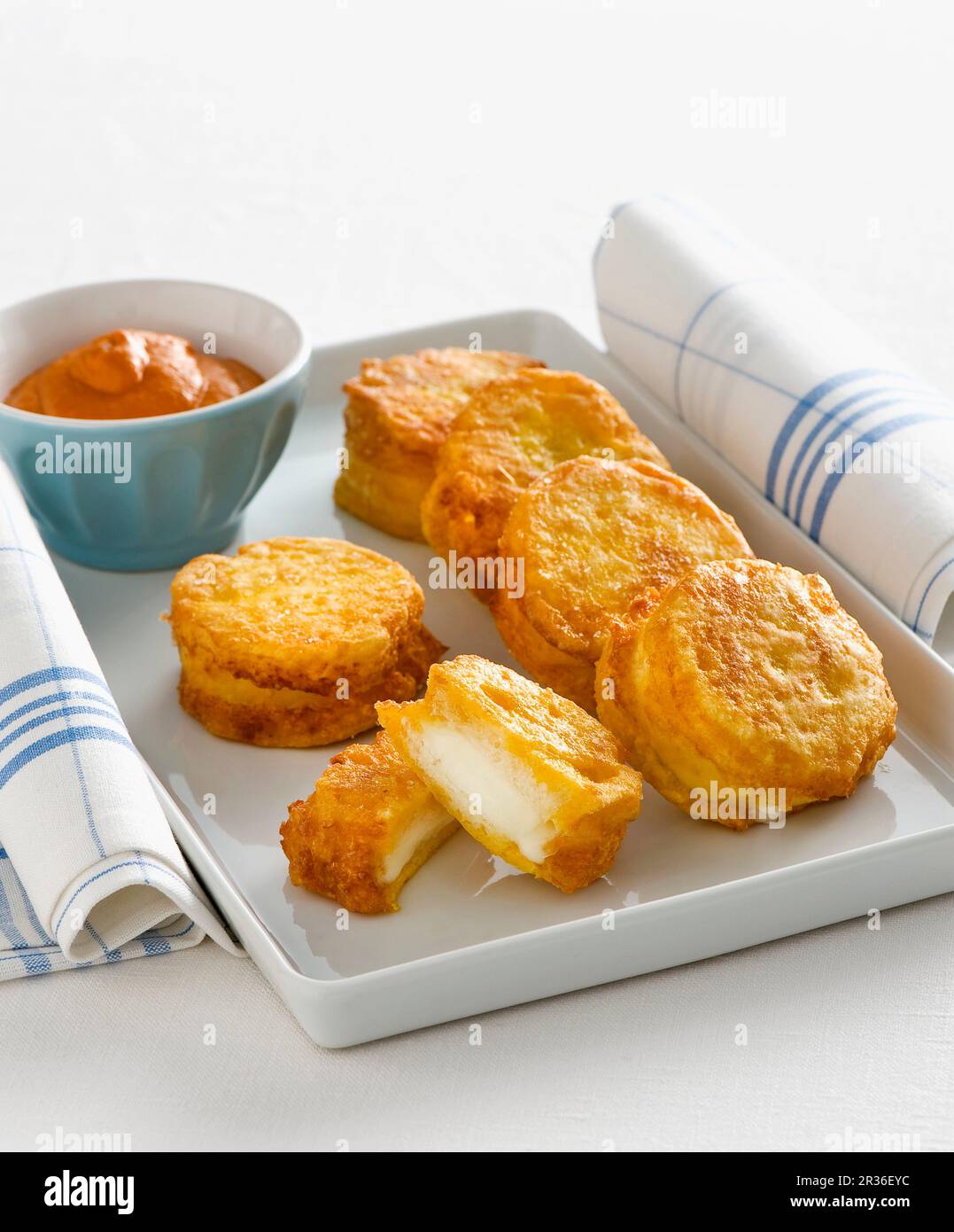 Mozzarelline in carrozza (breaded, fried mozzarella fritters, Italy