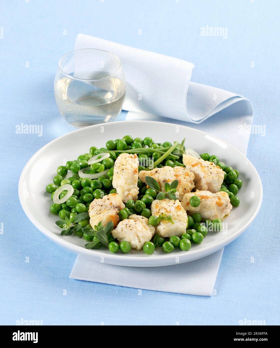 Monkfish with baby peas Stock Photo