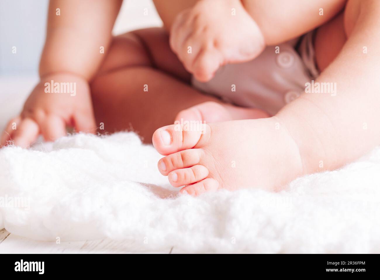 Baby hands and foot Stock Photo