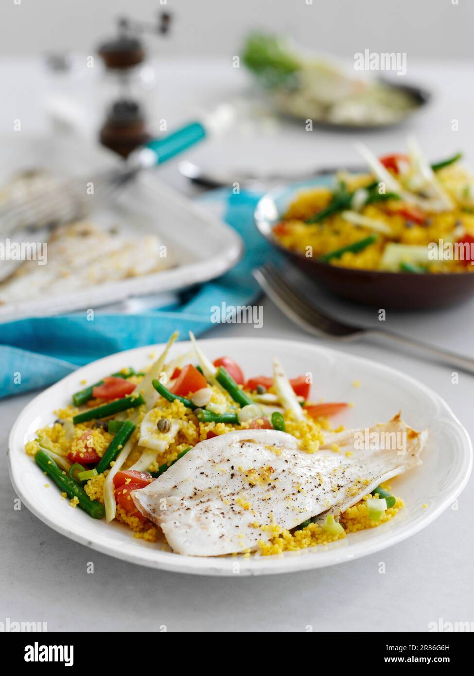 Grilled lemon sole with golden couscous and fennel Stock Photo Alamy