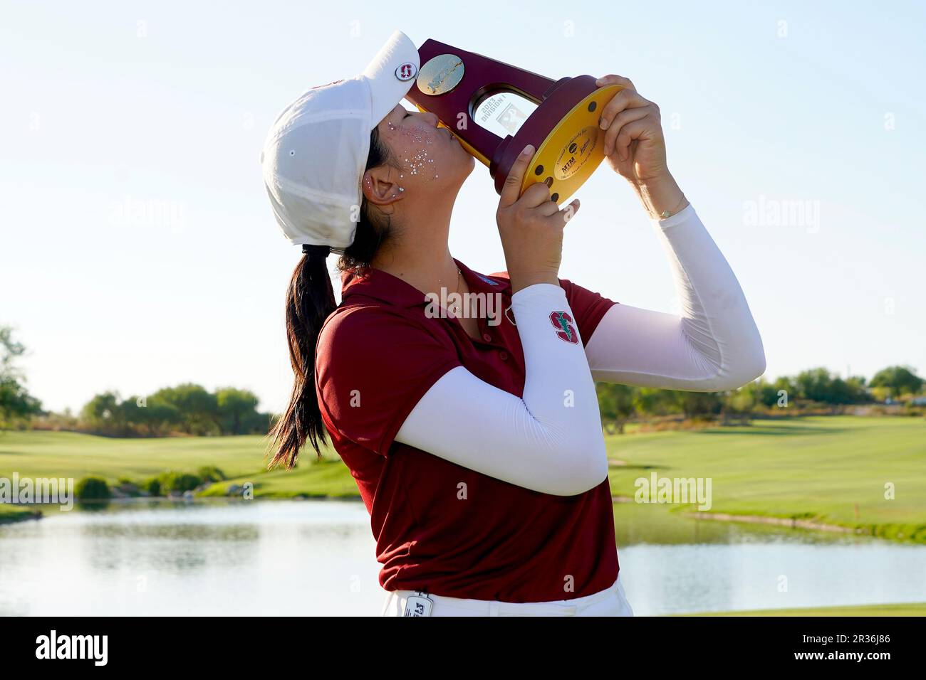 Stanford golfer Rose Zhang kisses the champions trophy after the final