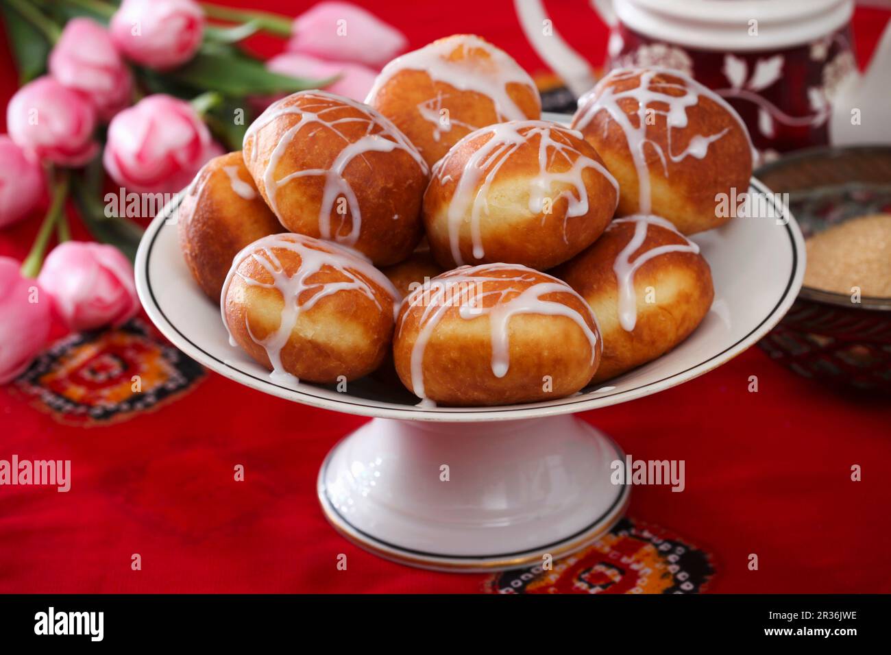 Mini doughnuts with white icing Stock Photo