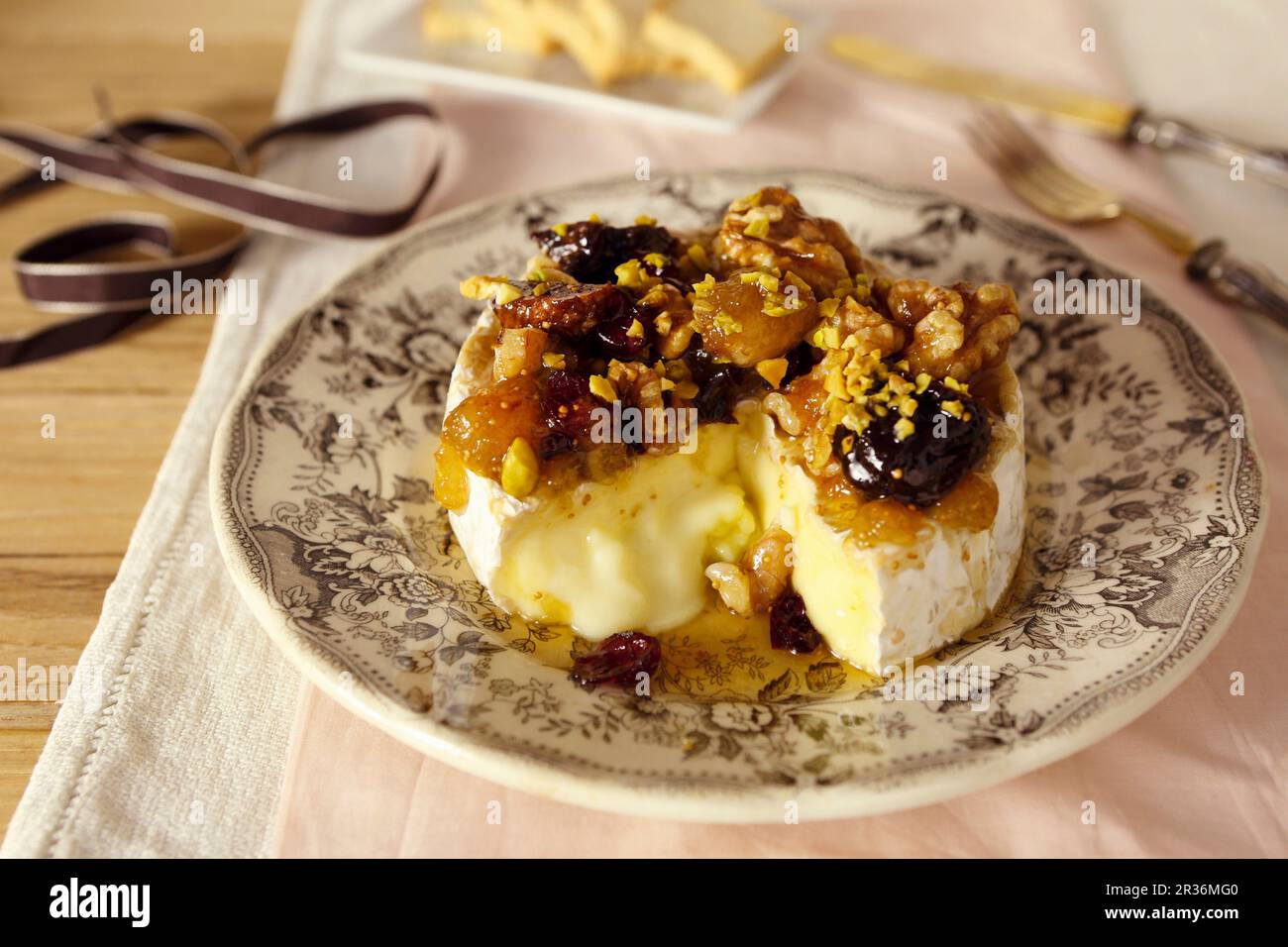 Baked Camembert with dried fruit compote Stock Photo
