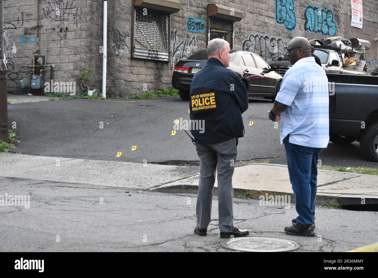 Paterson, United States. 22nd May, 2023. Police officers at the crime
