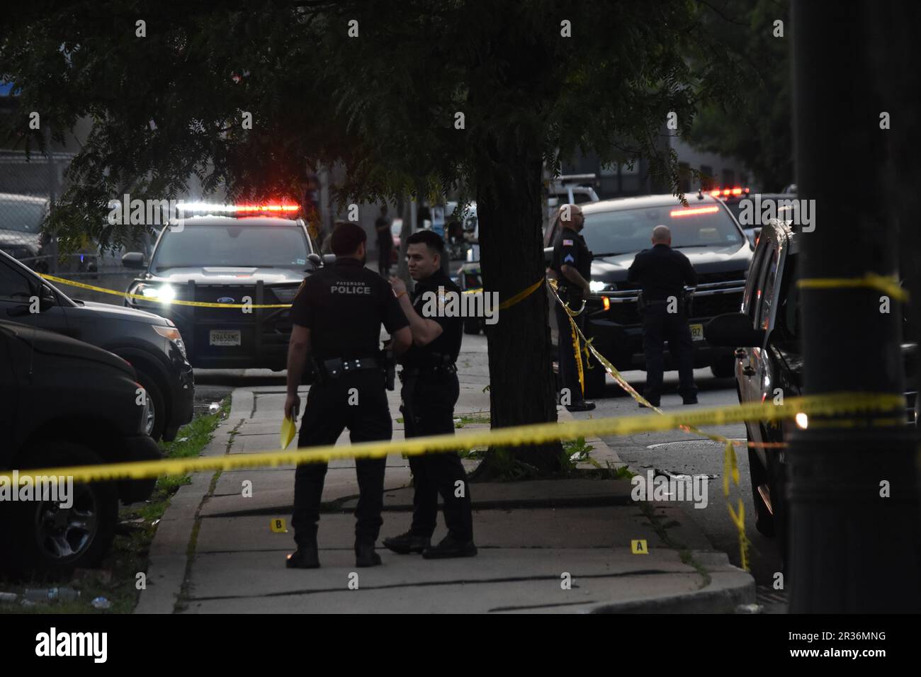 Paterson, United States. 22nd May, 2023. Police officers at the crime