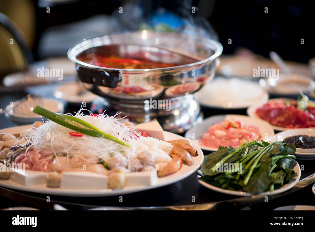 Fondue chinoise with chicken; fondue … – License Images – 211810 ❘ StockFood