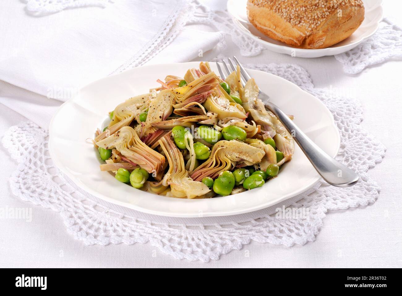 Frittedda siciliana (Italian artichoke & broad bean salad Stock Photo ...
