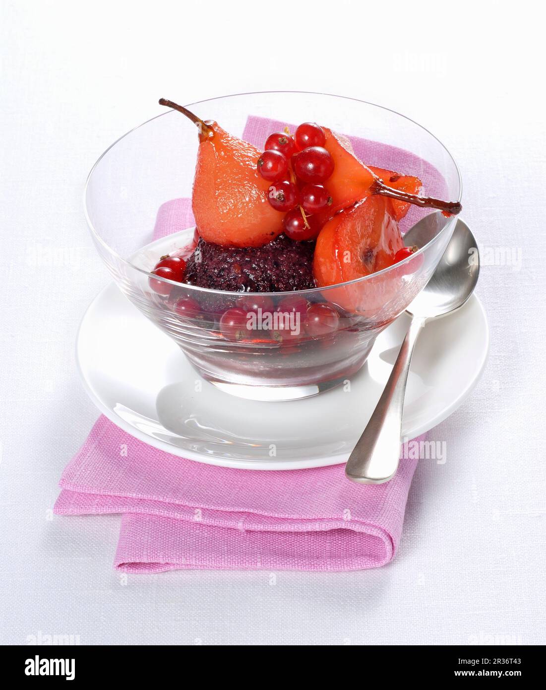 Berry ice cream with pear & redcurrant salad Stock Photo